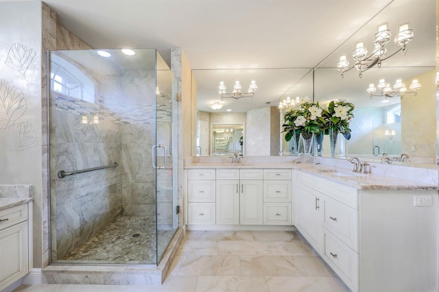 bathroom featuring an enclosed shower and vanity