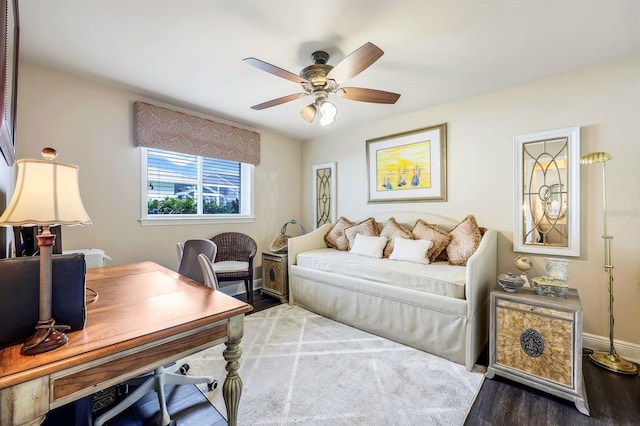 interior space with hardwood / wood-style floors and ceiling fan