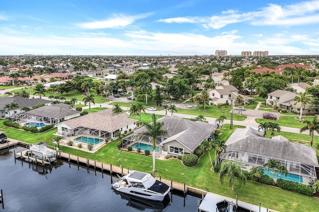 drone / aerial view with a water view