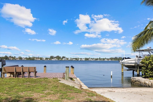 dock area featuring a water view