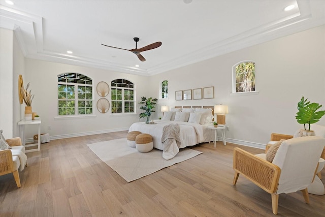 bedroom with recessed lighting, multiple windows, and light wood-style flooring