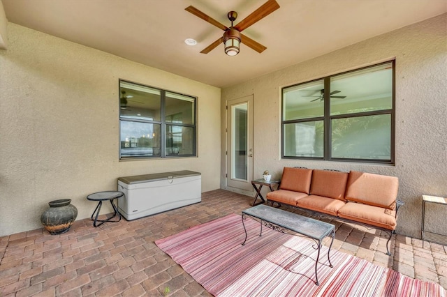 view of patio / terrace featuring ceiling fan and an outdoor hangout area