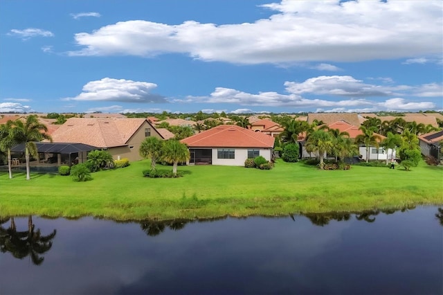 birds eye view of property featuring a water view