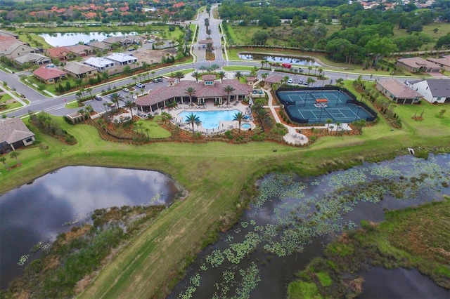 drone / aerial view with a water view