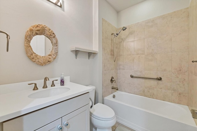 full bathroom featuring tiled shower / bath combo, toilet, and vanity