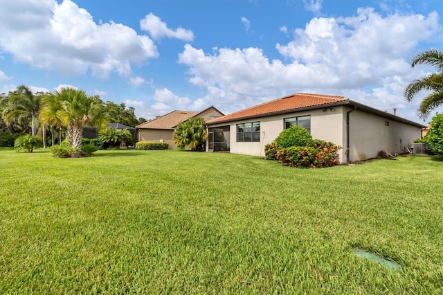 view of front of home with a front lawn