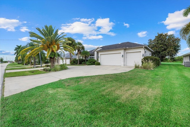 single story home with a front yard, stucco siding, and concrete driveway