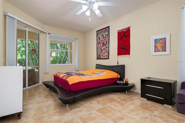 tiled bedroom featuring access to exterior and ceiling fan