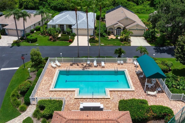 view of swimming pool with a patio area