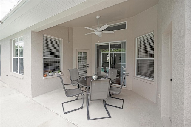 view of patio / terrace featuring ceiling fan