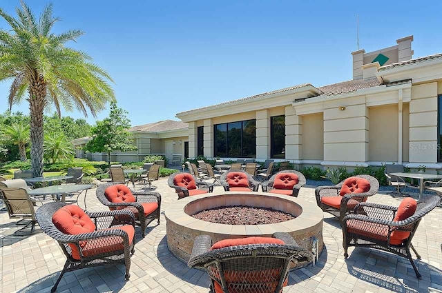 view of patio / terrace featuring a fire pit