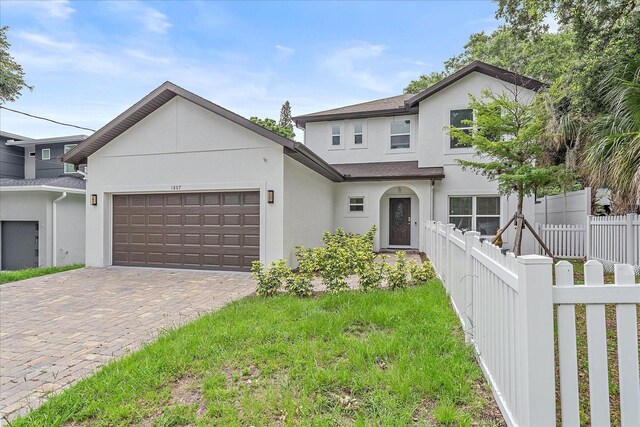 view of front of property with a garage