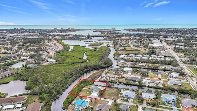 aerial view featuring a water view