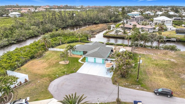 drone / aerial view featuring a water view