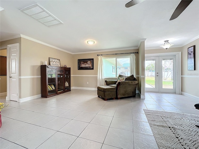 living room featuring ceiling fan, french doors, light tile patterned flooring, and crown molding