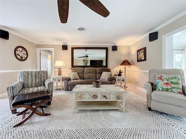 tiled living room featuring crown molding