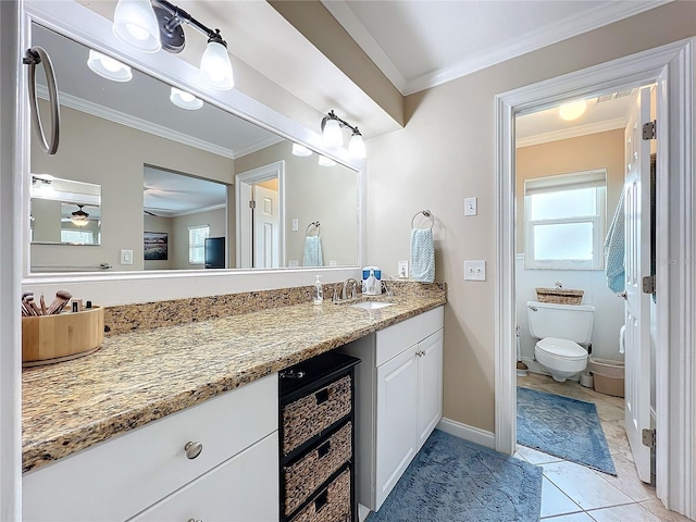 bathroom with toilet, ceiling fan, wine cooler, ornamental molding, and vanity