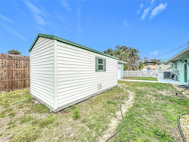 view of property exterior with a yard