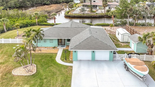 drone / aerial view featuring a water view