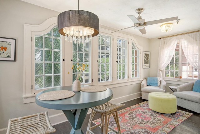 interior space featuring a wealth of natural light and a chandelier