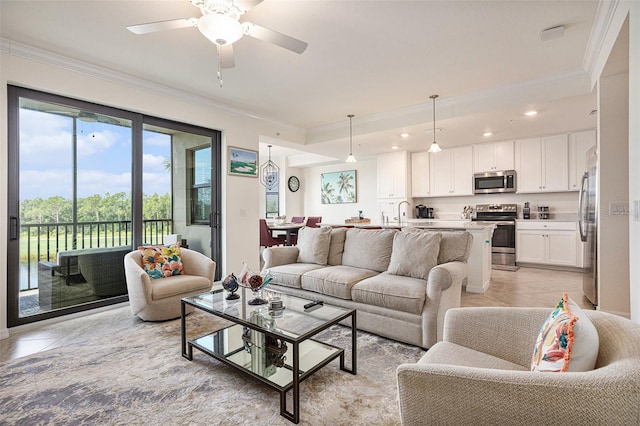 living room featuring ceiling fan, light tile patterned flooring, and crown molding