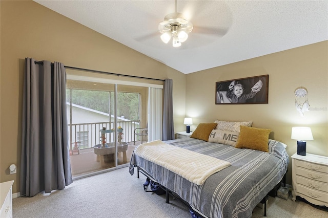 carpeted bedroom with vaulted ceiling, ceiling fan, access to exterior, and a textured ceiling