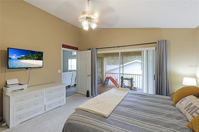 bedroom with light colored carpet, lofted ceiling, and access to exterior