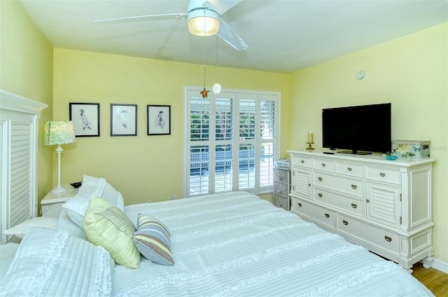 bedroom featuring a ceiling fan and light wood-style floors