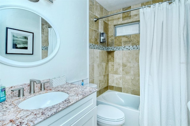 bathroom with shower / bathtub combination with curtain, toilet, and vanity