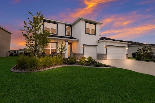 view of front of property with a lawn