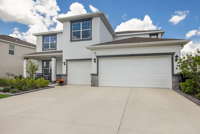 view of front of property with a garage