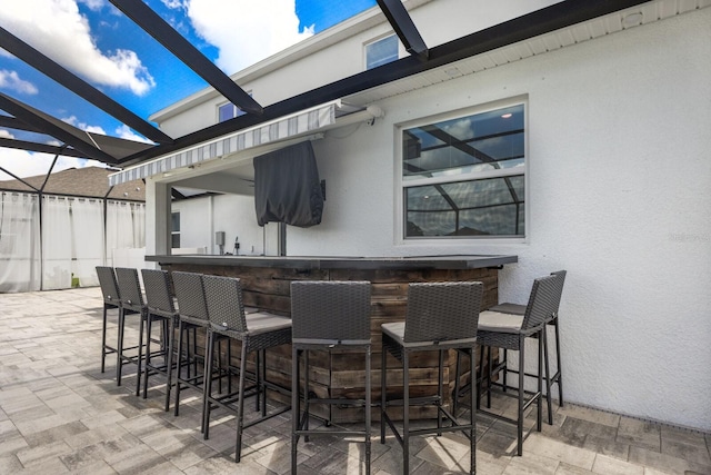 view of patio with a bar