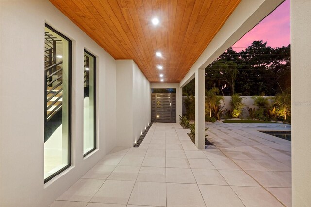 view of patio featuring fence