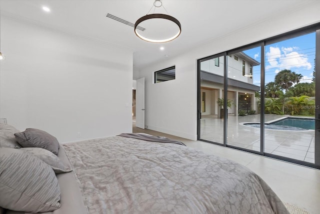 bedroom featuring access to outside, baseboards, and recessed lighting