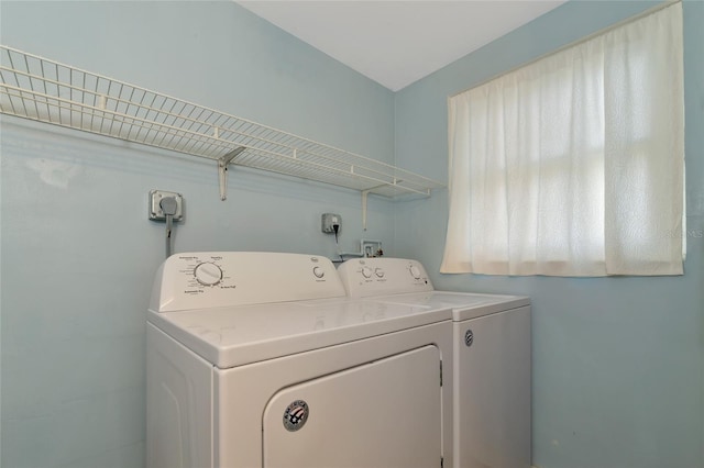 laundry room featuring washer and clothes dryer