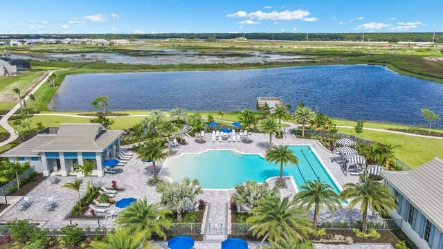 bird's eye view with a water view