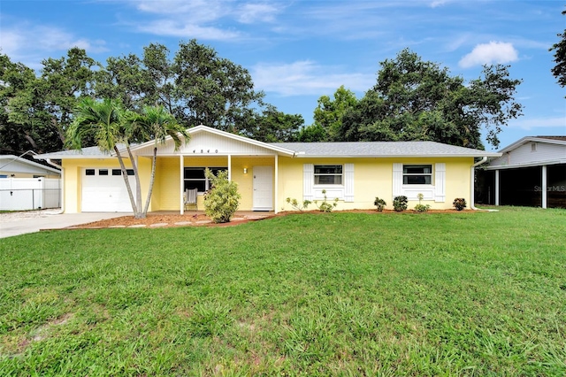 ranch-style home featuring a garage and a front yard