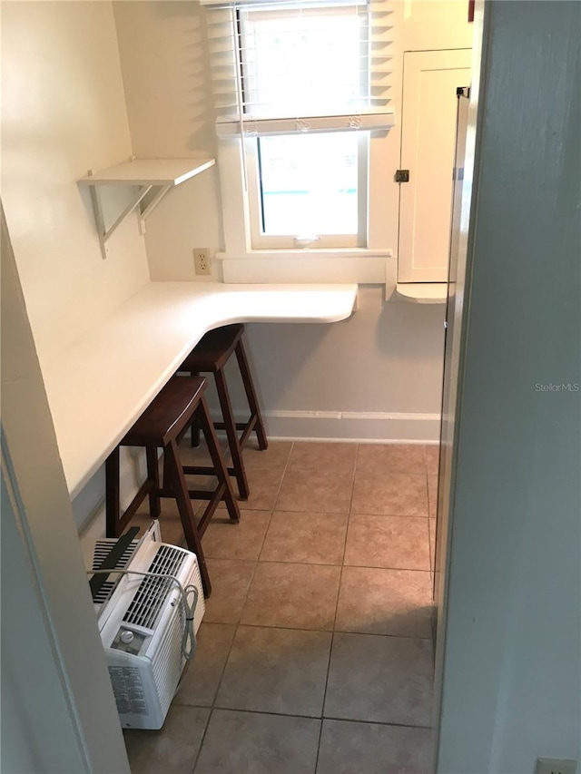 tiled home office with built in desk