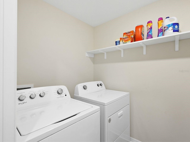 laundry room featuring independent washer and dryer