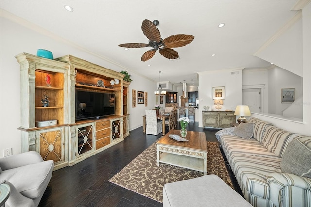 living room with ceiling fan, crown molding, and dark hardwood / wood-style flooring