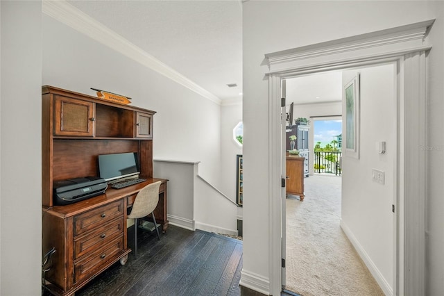 carpeted office with ornamental molding