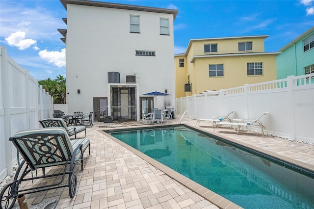 view of pool with a patio