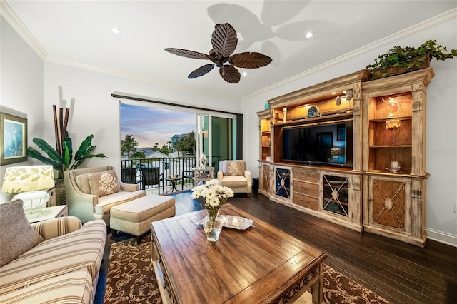 living room with crown molding, ceiling fan, and hardwood / wood-style floors