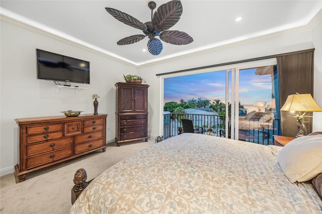 carpeted bedroom with access to outside, ceiling fan, and ornamental molding