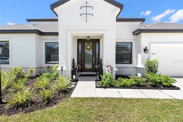 entrance to property featuring a garage