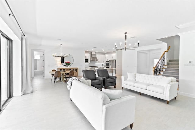 living room with stairs, baseboards, a notable chandelier, and recessed lighting