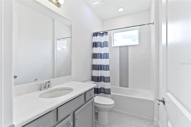 full bathroom featuring toilet, shower / tub combo, vanity, and tile patterned floors