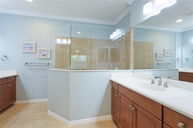 bathroom featuring vanity, crown molding, tile patterned floors, and tiled shower