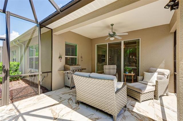 view of patio / terrace with ceiling fan and grilling area