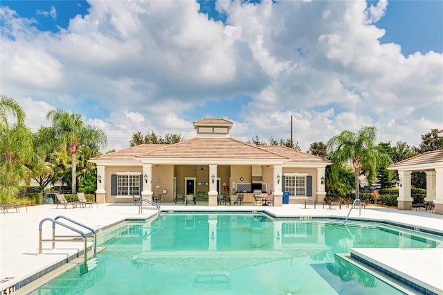 view of swimming pool featuring a gazebo and a patio